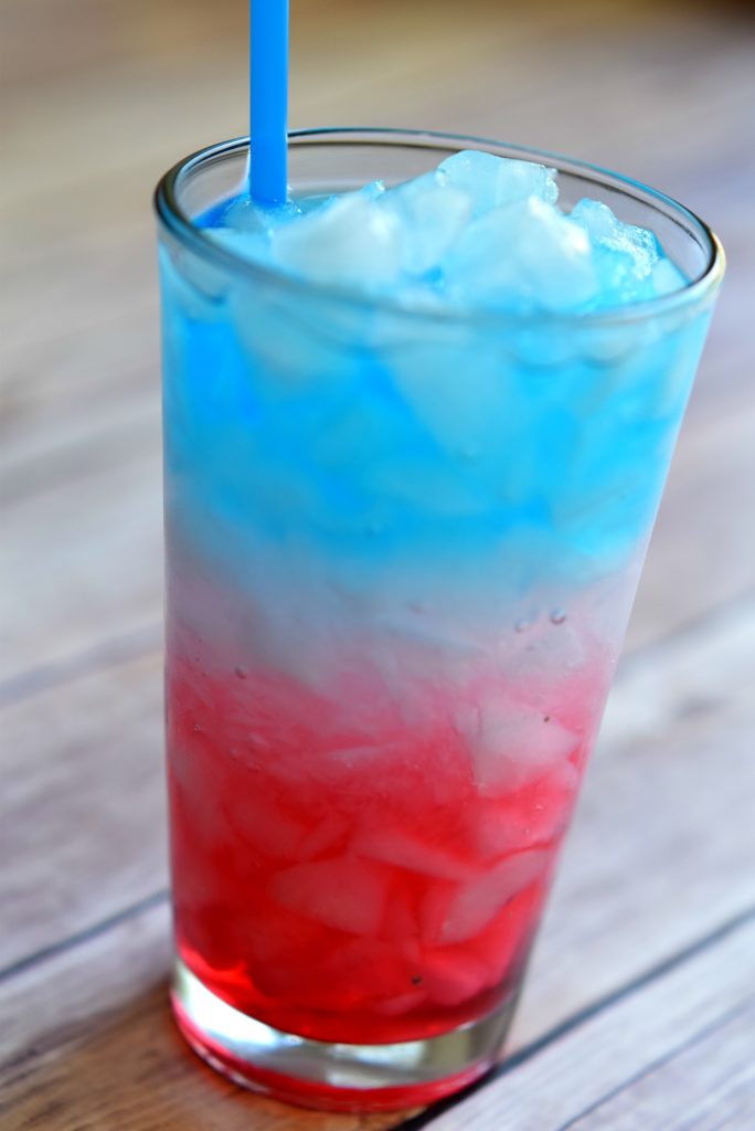 Learn how to make a layered drink by making this sweet 4th of July layered drink!