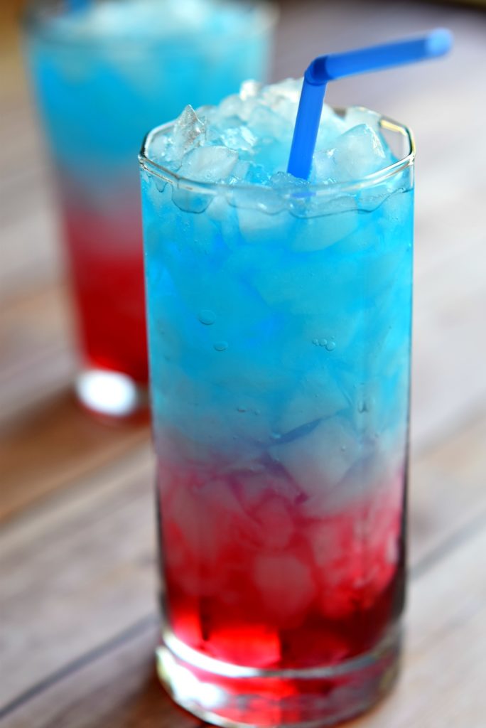 So fun! Learn how to make a layered drink by making this sweet 4th of July layered drink!