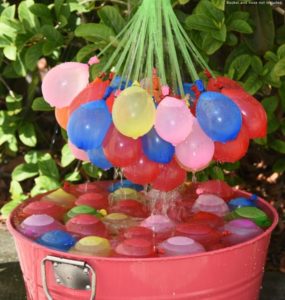 how to tie & fill over 100 water balloons in a minute! (biodegradable too)