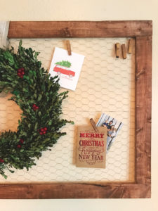 DIY- Create this holiday card holder for under $15. Using chicken wire and stained wood.