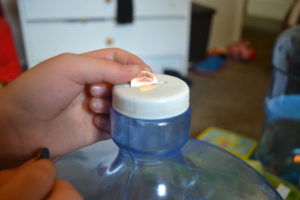 penny, water container, hand