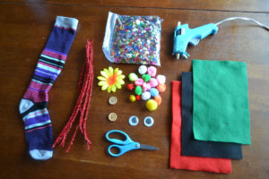 supplies, sock, scissors, hot glue gun