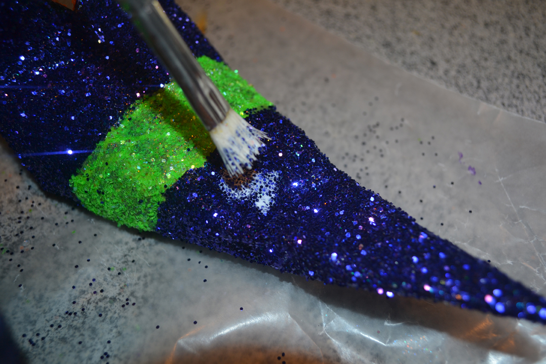 paint brush, glue, witch shoe