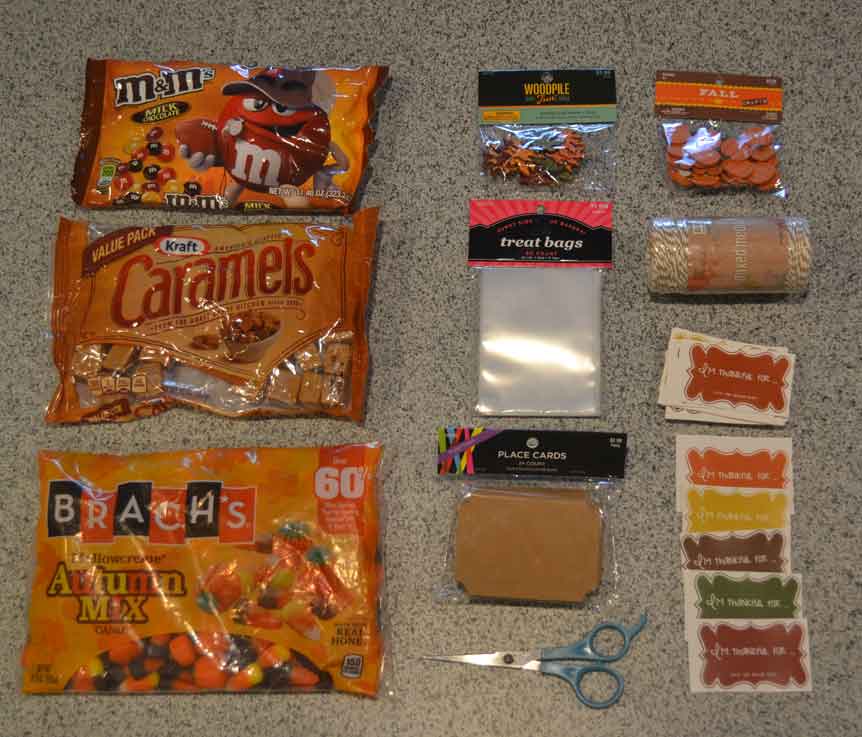 scissors, candy, treat bags, labels