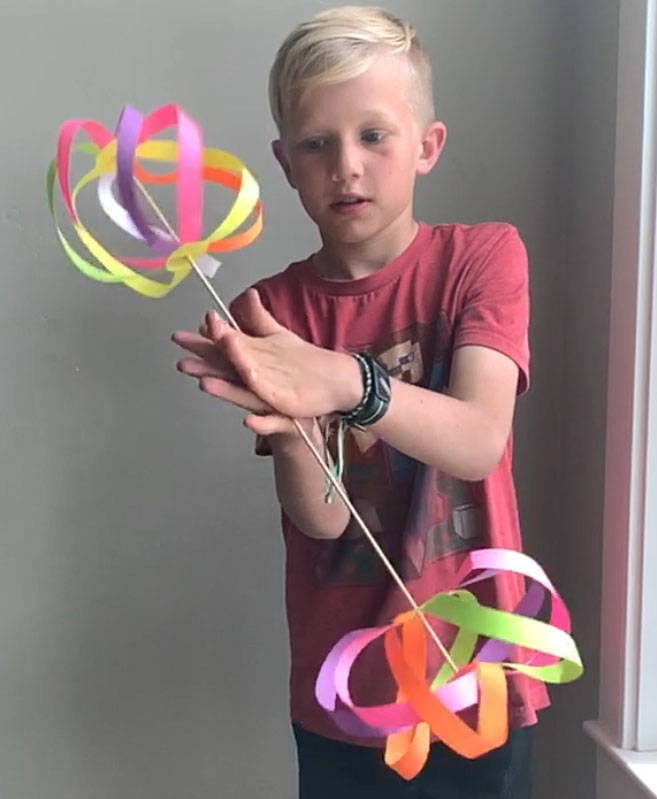 This mesmerizing paper spinner toy is a perfect activity for your kids that will leave them says WOW!! It is simple and easy to make with little help! 