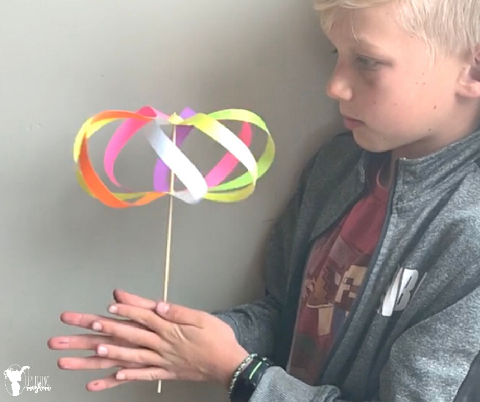 This mesmerizing paper spinner toy is a perfect activity for your kids that will leave them says WOW!! It is simple and easy to make with little help!